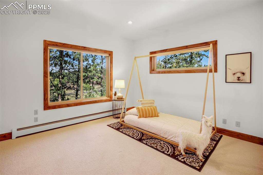 Image 32 of 48: Upper level 3rd bedroom