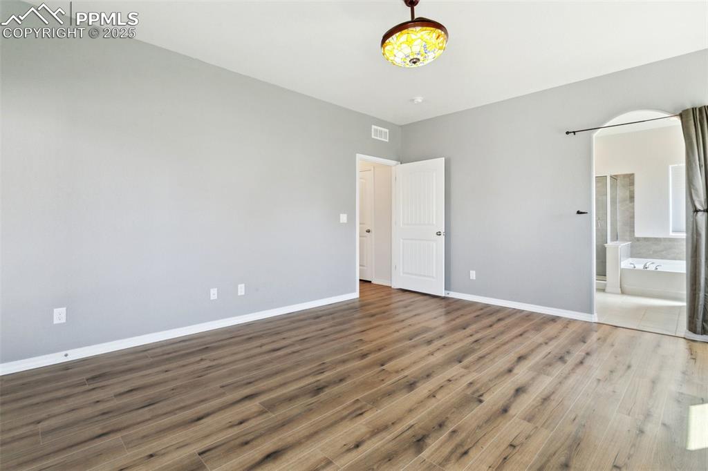 Image 22 of 37: Master Bedroom