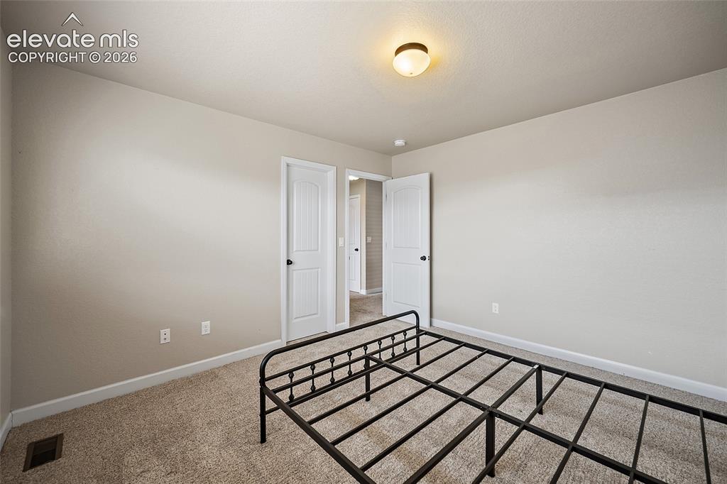 Image 16 of 25: Bedroom