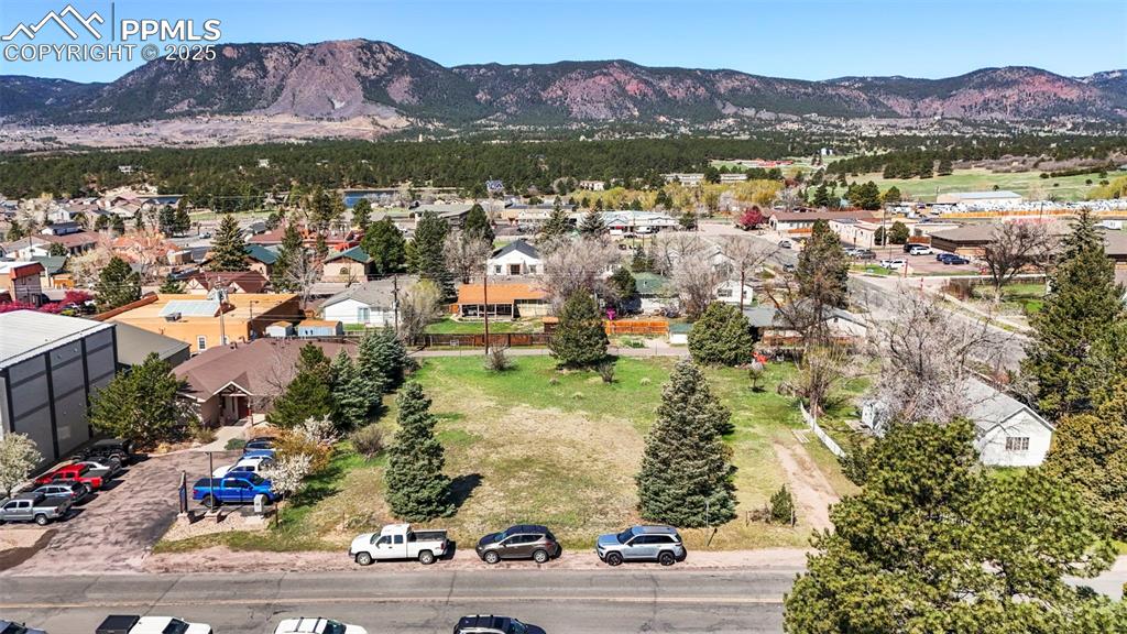 Image 7 of 8: Drone / aerial view with a residential view and a mountain view