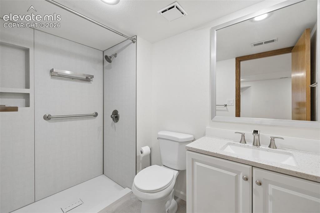 Image 38 of 44: Fully redesigned basement 3/4 bath