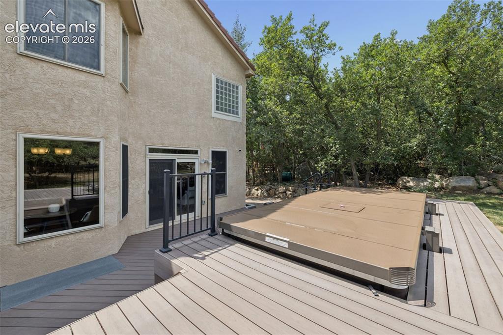 Image 40 of 44: Expansive rear deck to enjoy the expansive yard backing to additional open 