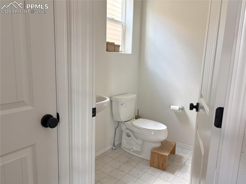 Image 15 of 35: Downstairs half bath