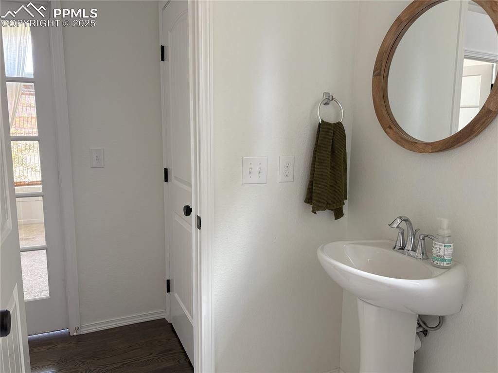 Image 16 of 35: Downstairs half bath
