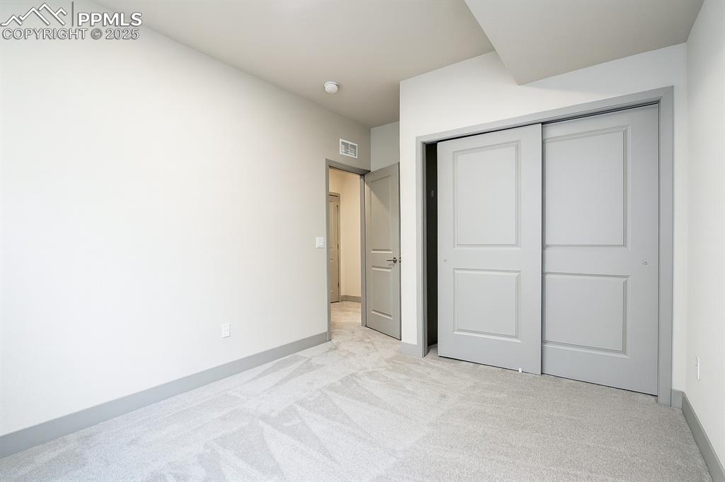 Image 14 of 38: Bedroom