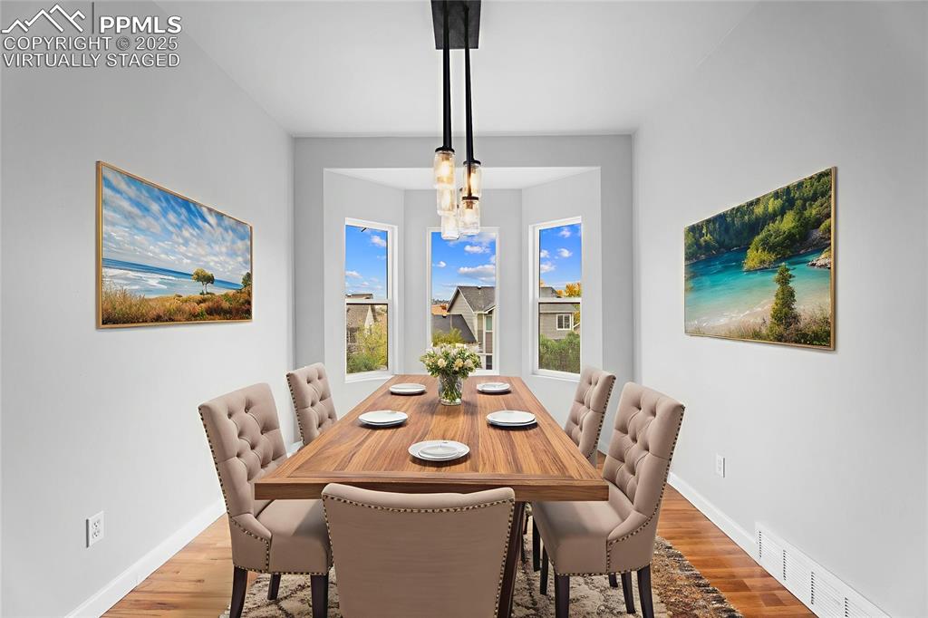 Image 10 of 49: Virtually Staged Dining Area