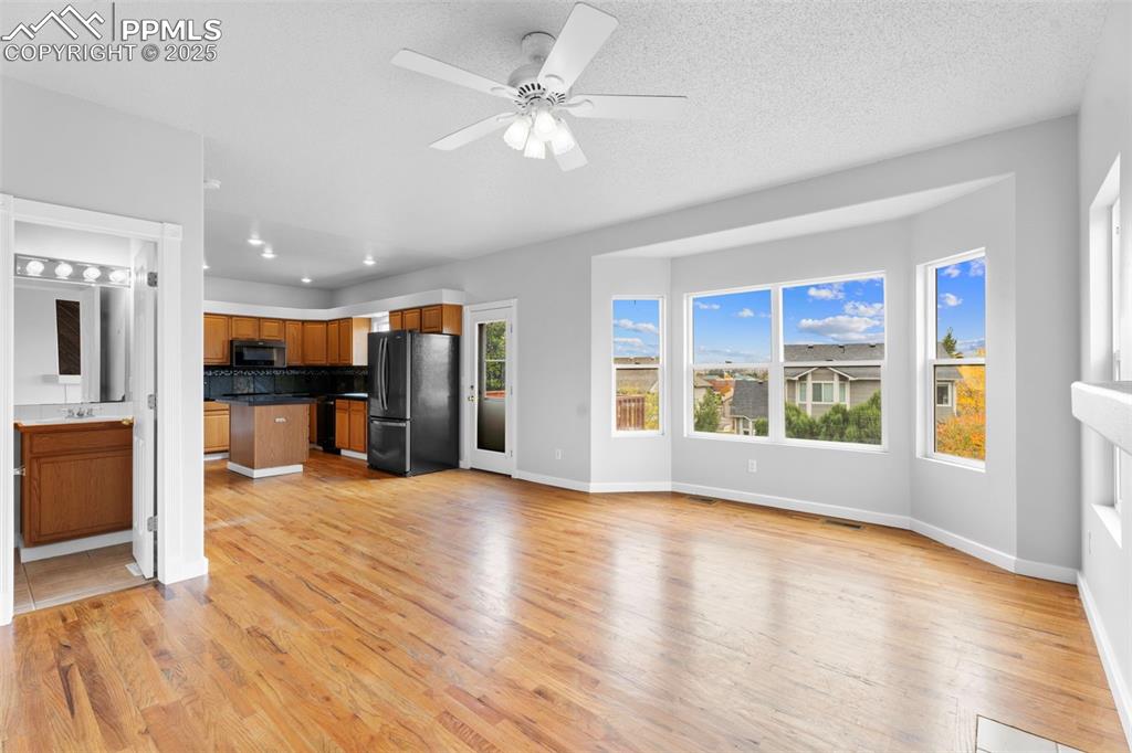 Image 17 of 49: Kitchen and Family Room