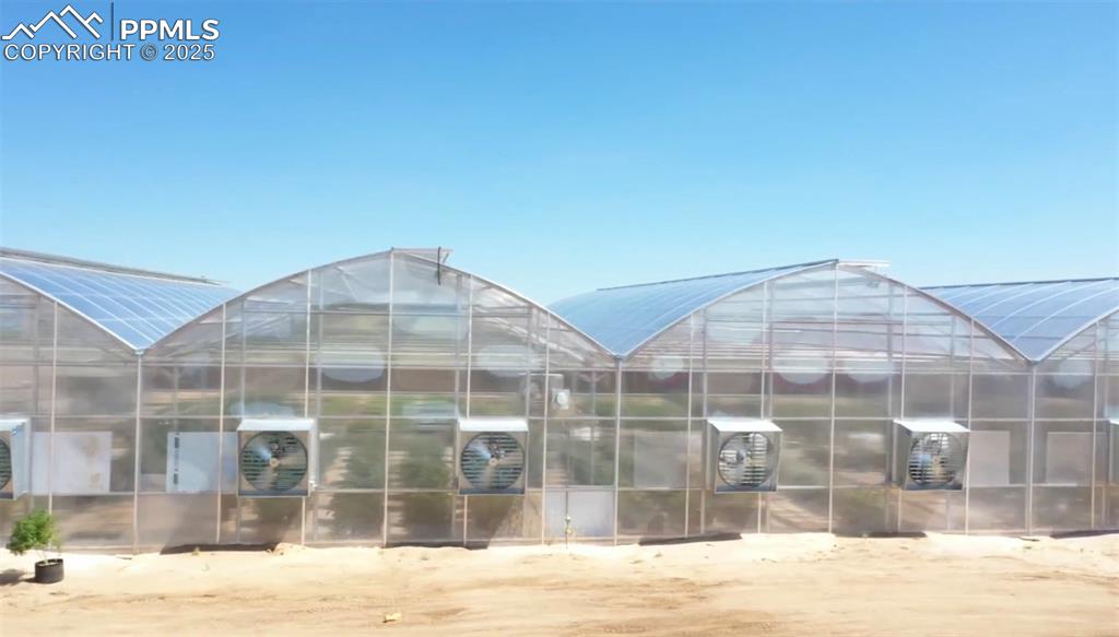 Image 47 of 50: Greenhouses