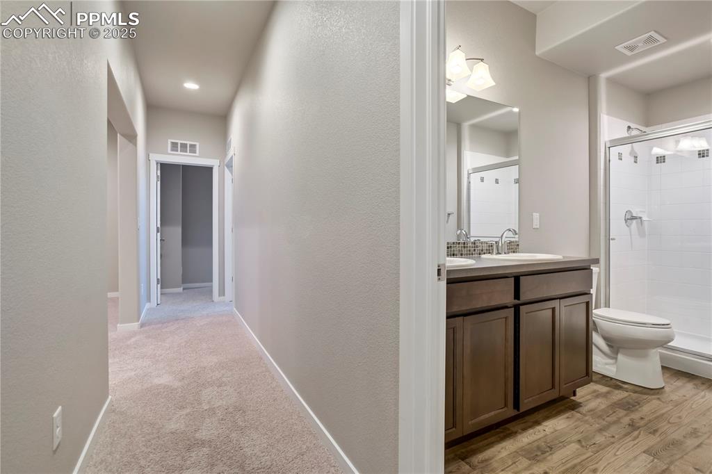 Image 43 of 50: Hall featuring a textured wall