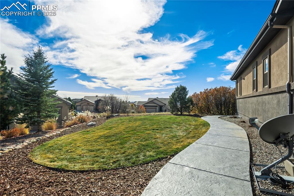 Image 45 of 50: View of grassy yard