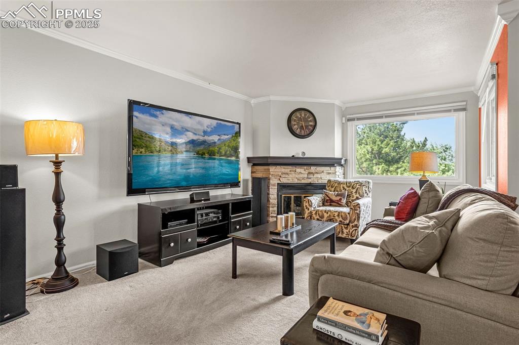 Image 15 of 37: Living room, mountain views, gas fireplace