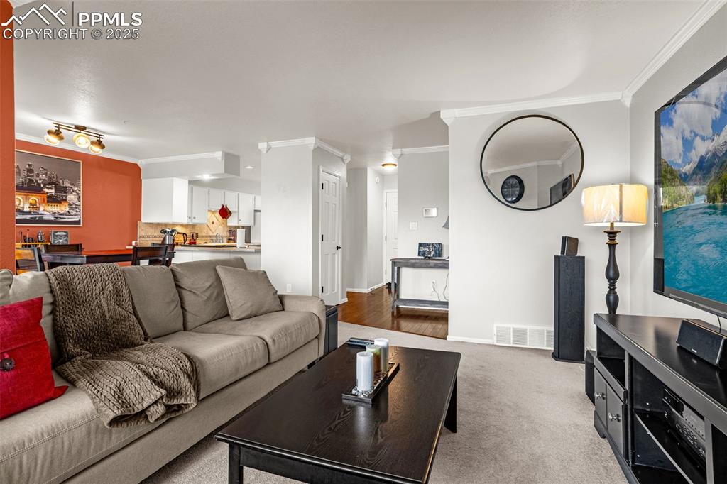 Image 17 of 37: Living room, mountain views, gas fireplace