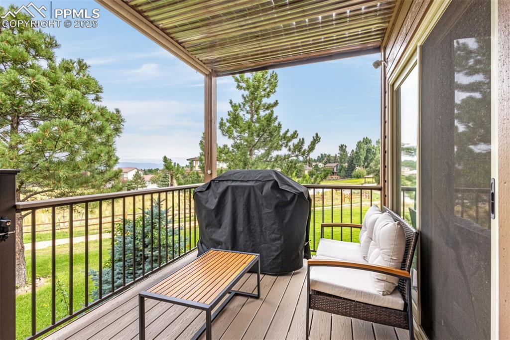 Image 2 of 37: Deck off of the main level