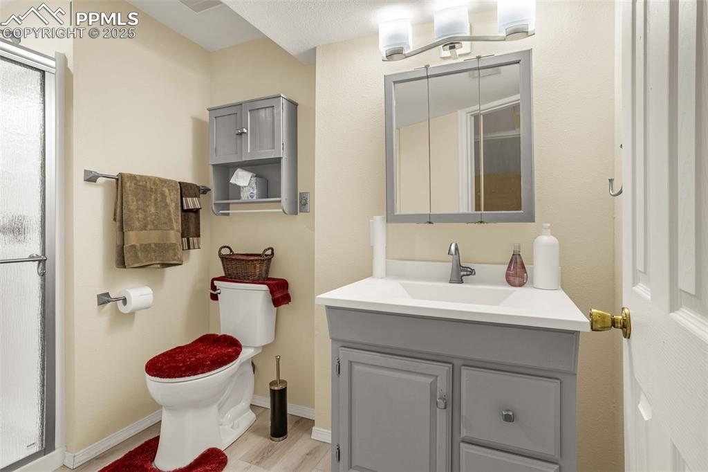 Image 23 of 37: Basement bath