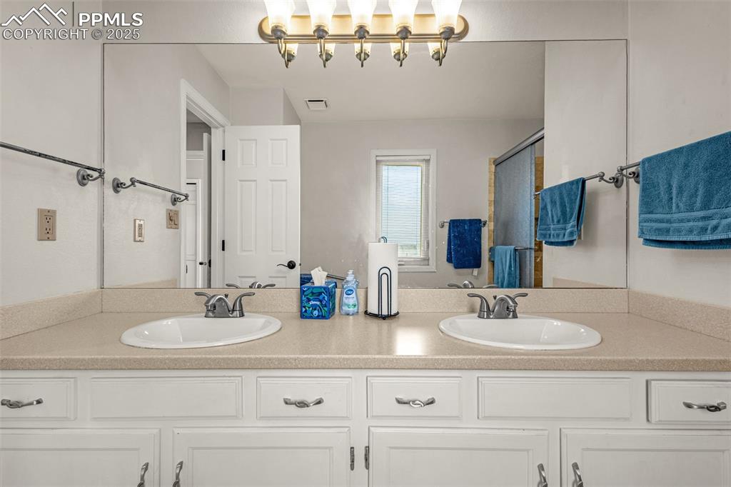 Image 31 of 37: Main bedroom bath