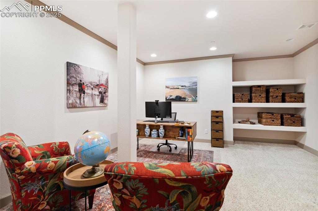 Image 34 of 49: Basement Study that is pre-wired for the potential of a dedicated theatre r