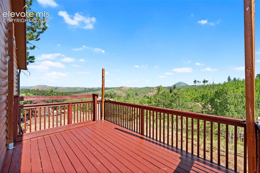 Image 18 of 31: Side deck off the dining area