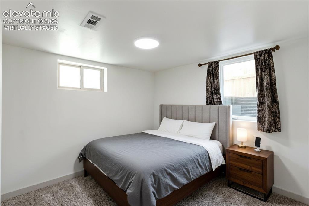 Image 10 of 33: 1 of 4 bedrooms, virtually staged