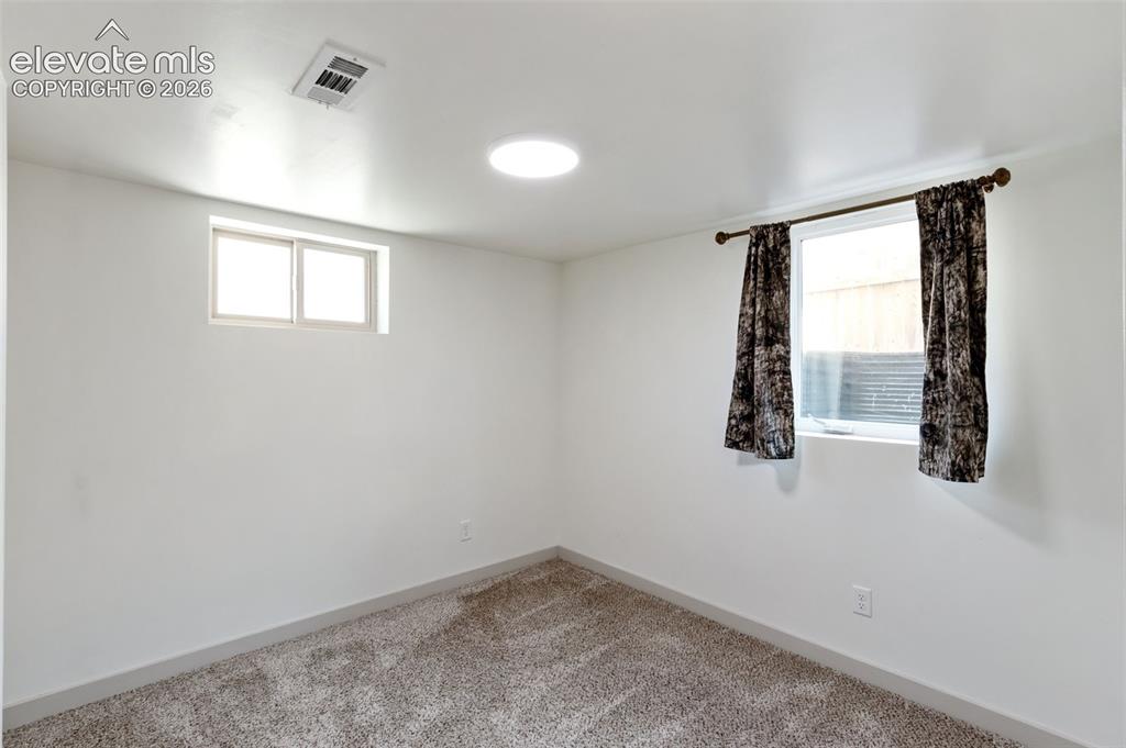 Image 22 of 33: 1 of 4 bedrooms