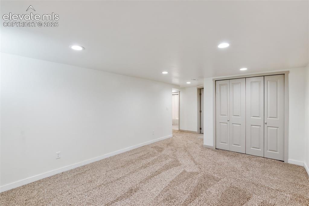 Image 29 of 33: finished basement, living room
