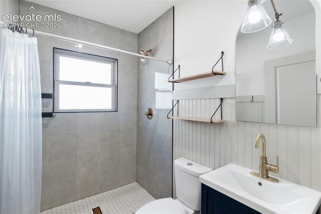 Image 5 of 33: Modern bathroom, fully remodeled, 1 of 2 full bathrooms