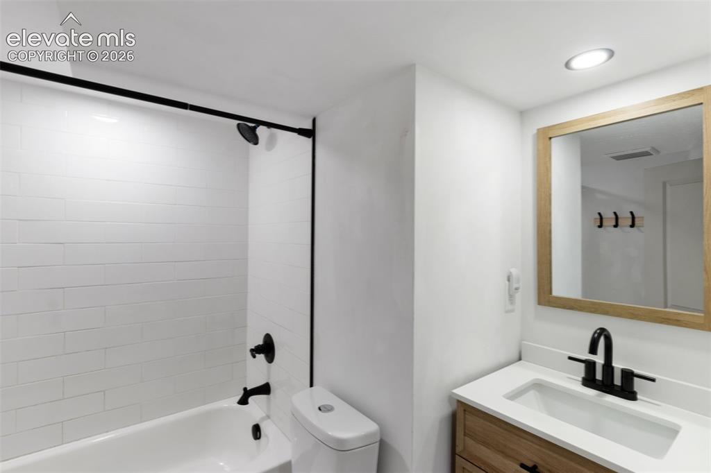 Image 6 of 33: Modern bathroom, fully remodeled, 1 of 2 full bathrooms