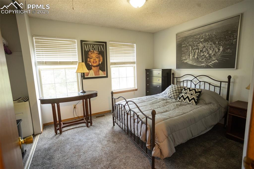 Image 25 of 33: Bedroom