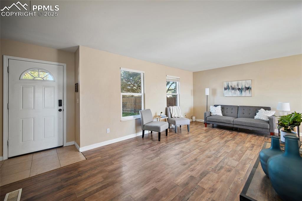 Image 7 of 45: Entrance foyer featuring plenty of natural light and wood finished floors