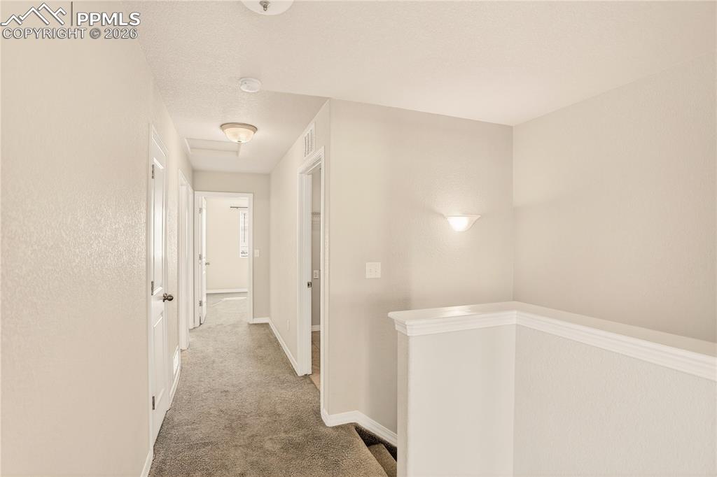 Image 20 of 38: Upper Level landing