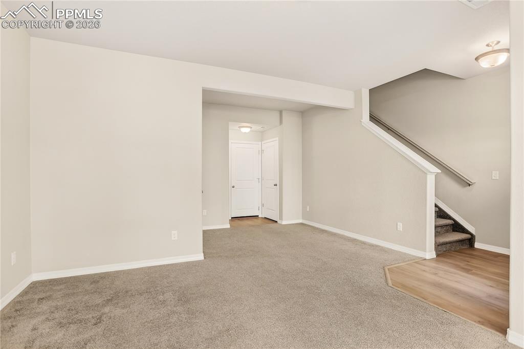Image 32 of 38: Entry Level has a flex room suitable for an office or family room