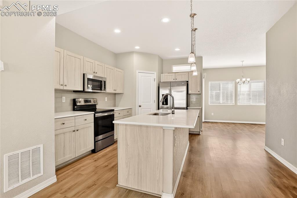 Image 7 of 38: Spacious kitchen