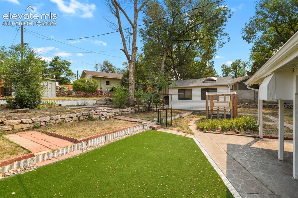Image 42 of 45: Backyard tiered section.