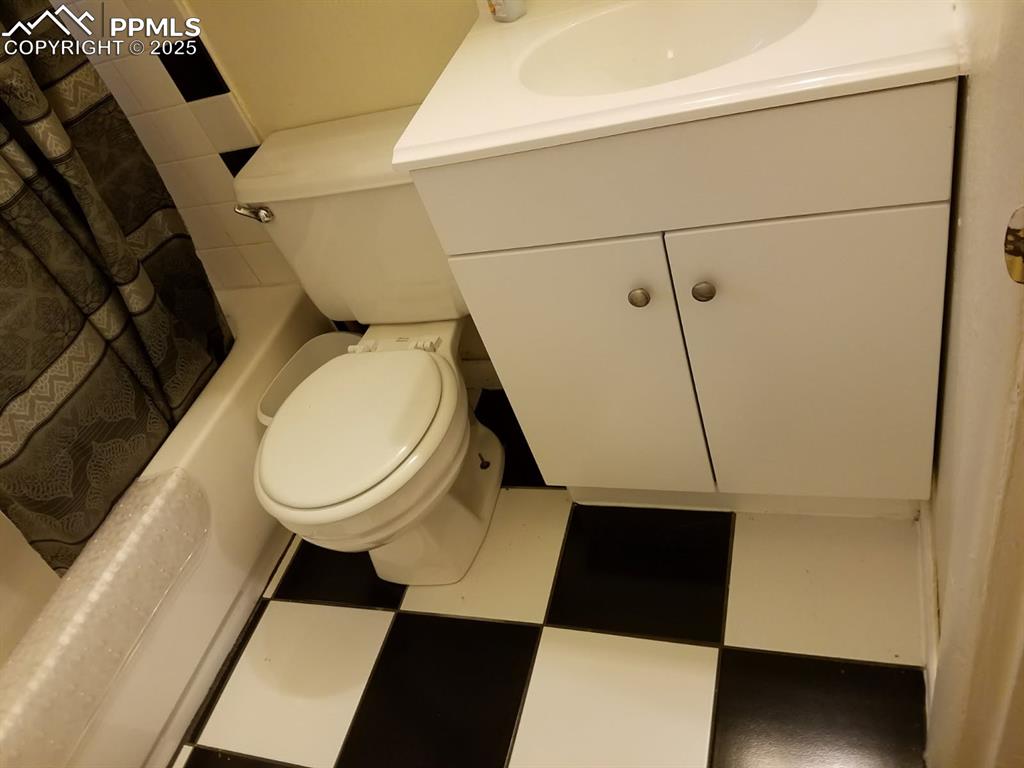 Image 18 of 25: Bathroom featuring toilet and vanity