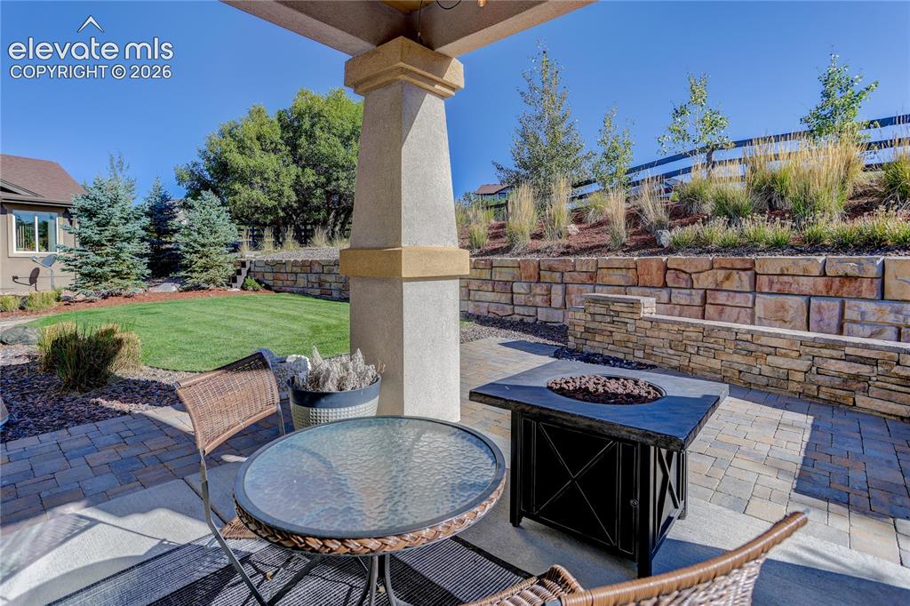 Image 23 of 29: Covered & extended patio for outdoor entertainment