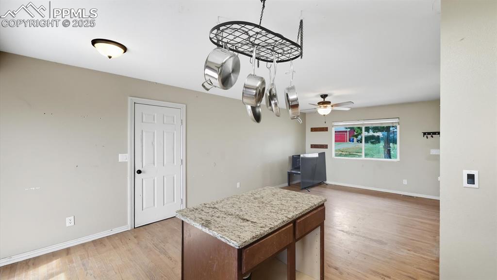 Image 13 of 34: The Kitchen/Dining Area has convenient garage access.