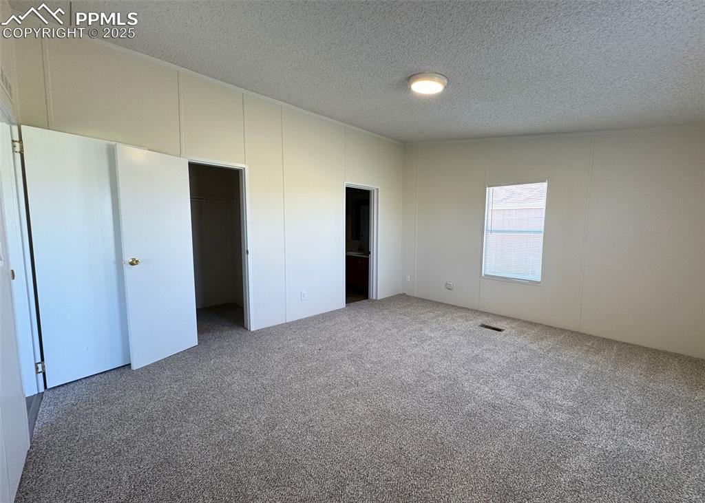 Image 12 of 47: Master Bedroom