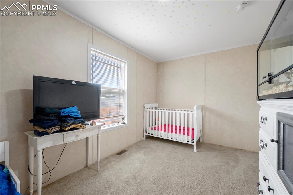 Image 16 of 29: Bedroom