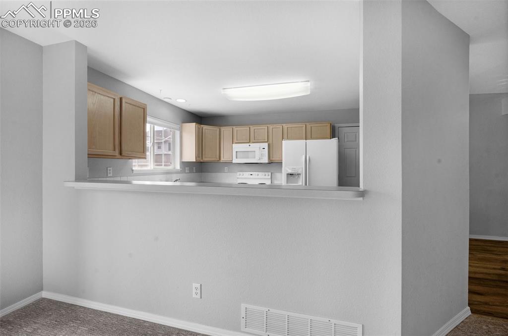 Image 9 of 27: kitchen with breakfast bar