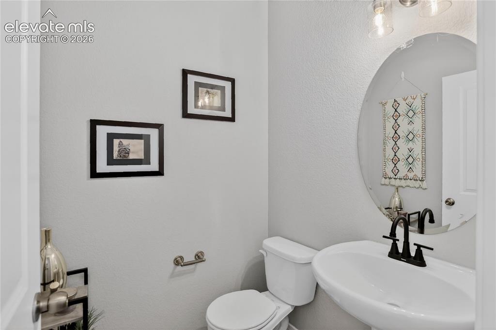 Image 13 of 30: Powder room - main level