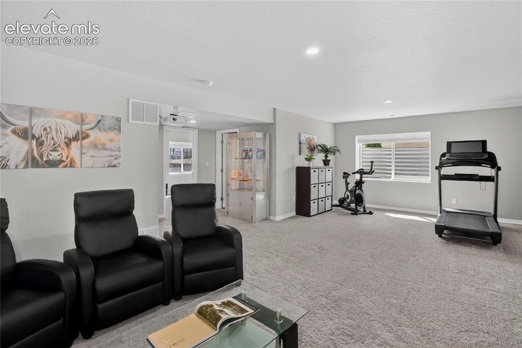 Image 18 of 30: Spacious rec room - lower level