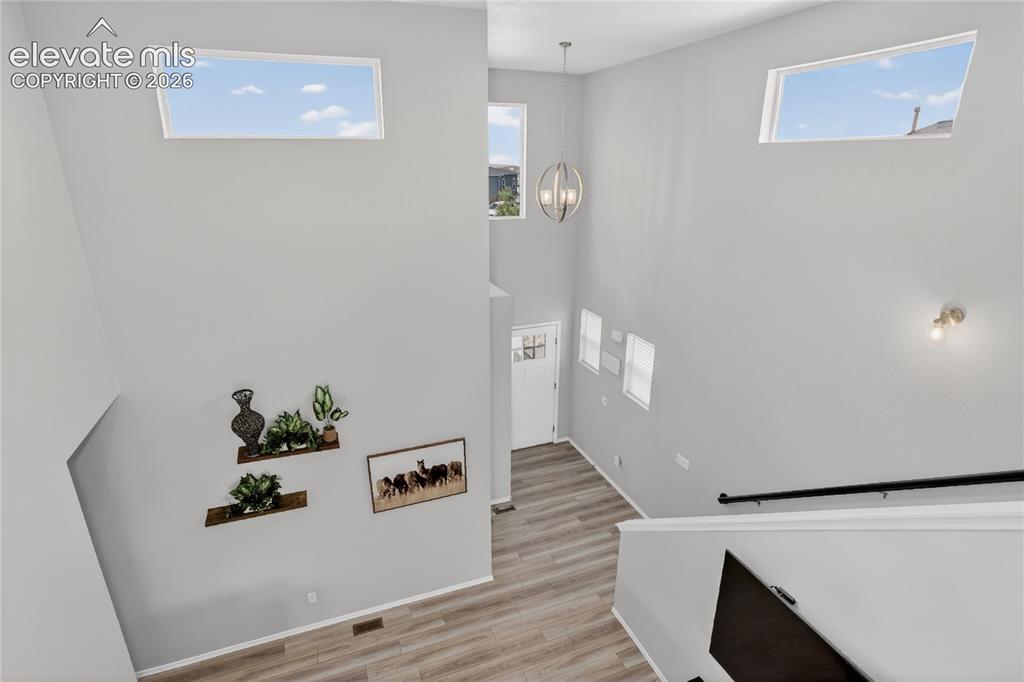 Image 2 of 30: Vaulted ceiling brings in lots of natural light