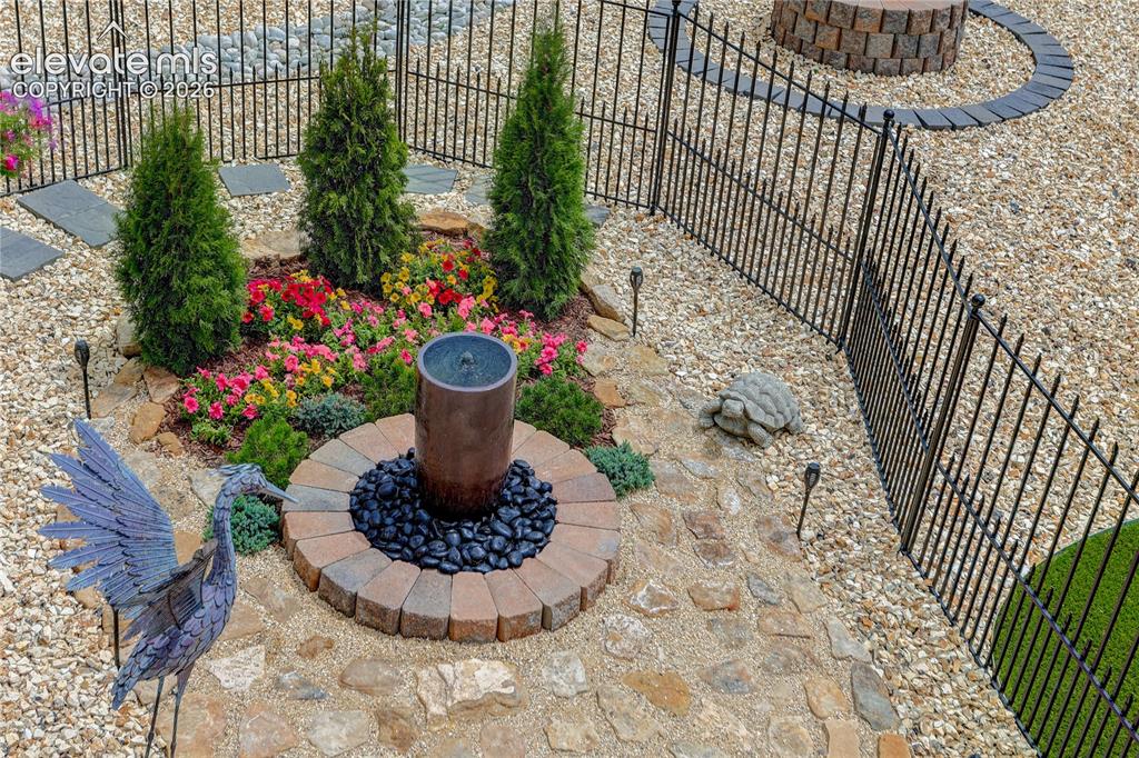 Image 25 of 30: Backyard water feature