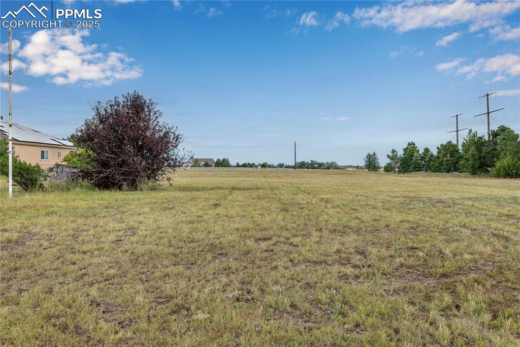Image 6 of 48: View of yard with a view of rural / pastoral area