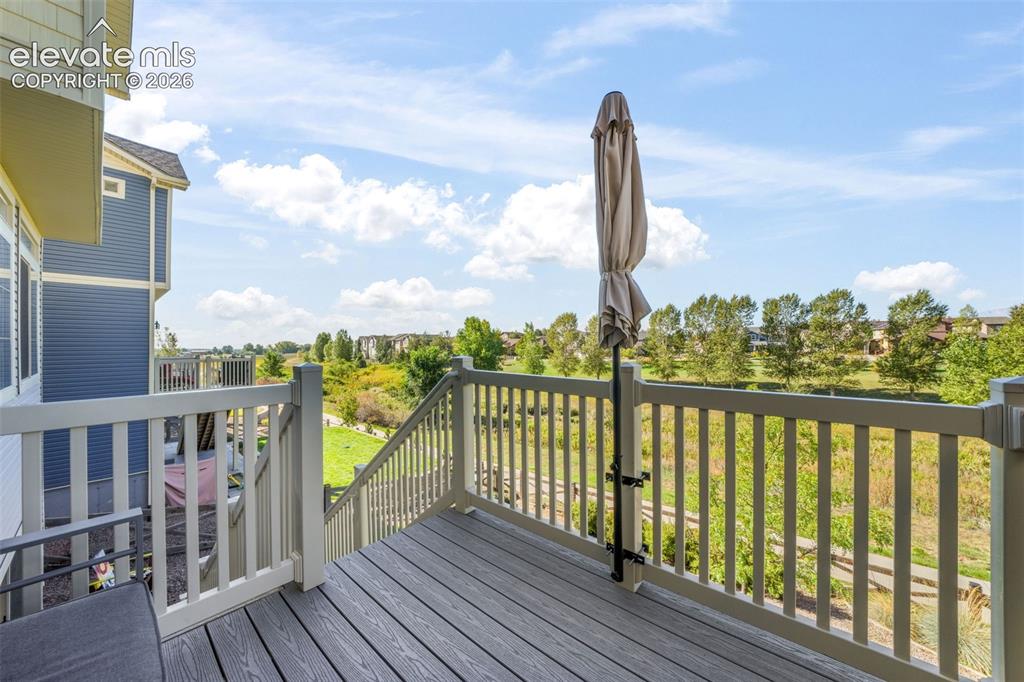 Image 42 of 48: Composite deck with matching railings and integrated steps