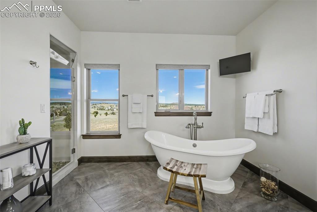 Image 19 of 50: Master Bedroom