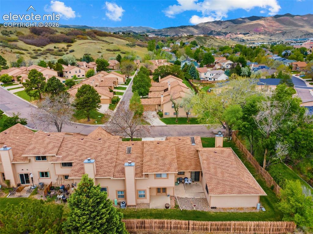 Image 32 of 32: Expansive residential area with a prominent mountain backdrop