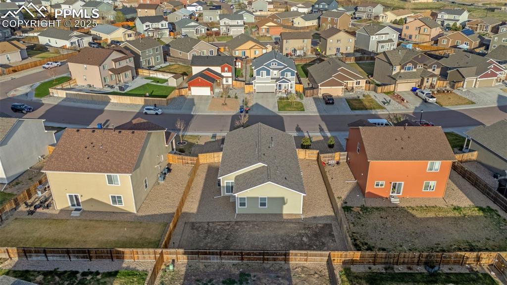 Image 24 of 28: Aerial view featuring a residential view