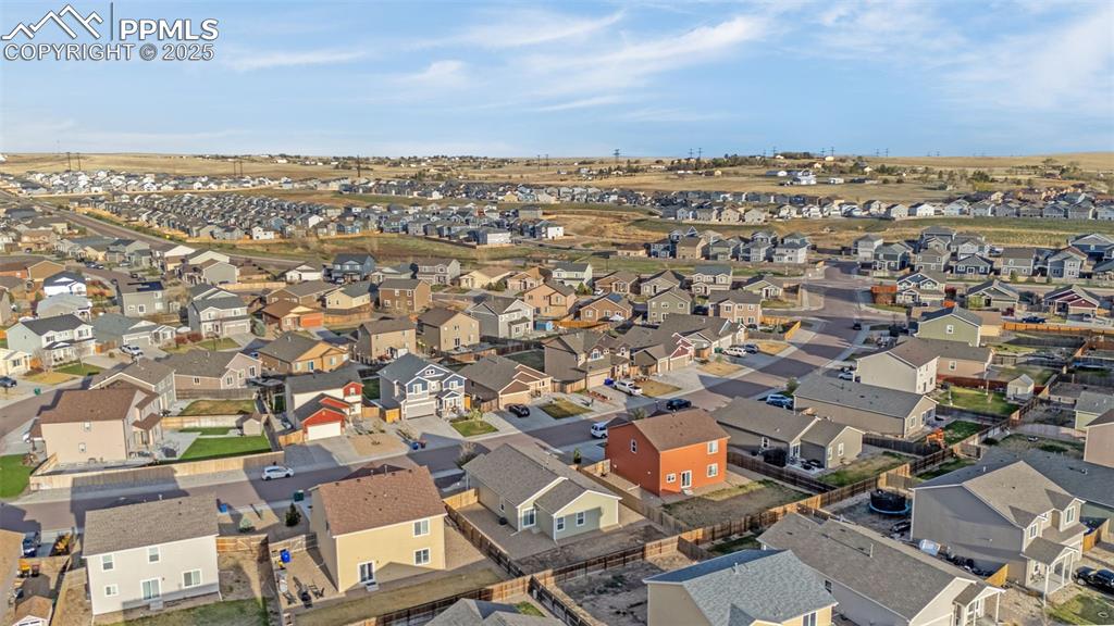 Image 25 of 28: Birds eye view of property with a residential view