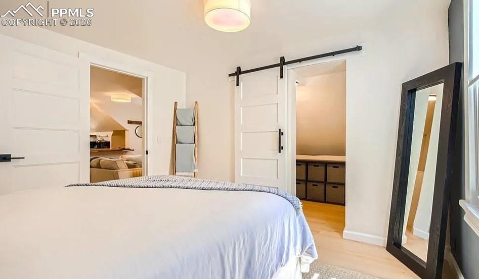 Image 13 of 18: Upper level bedroom