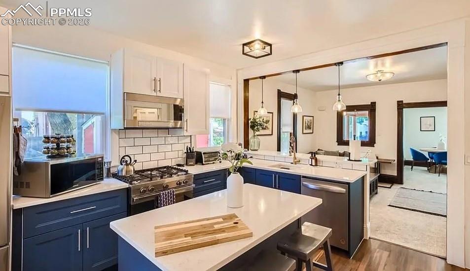 Image 5 of 18: Main level kitchen